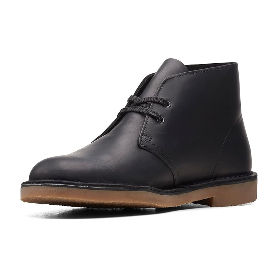 Zwarte heren chukka boots van leer met bruine zool