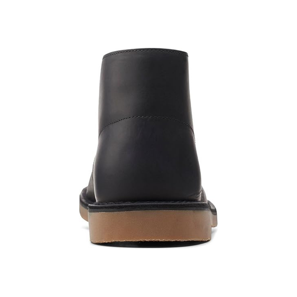 Zwarte heren chukka boots van leer met bruine zool